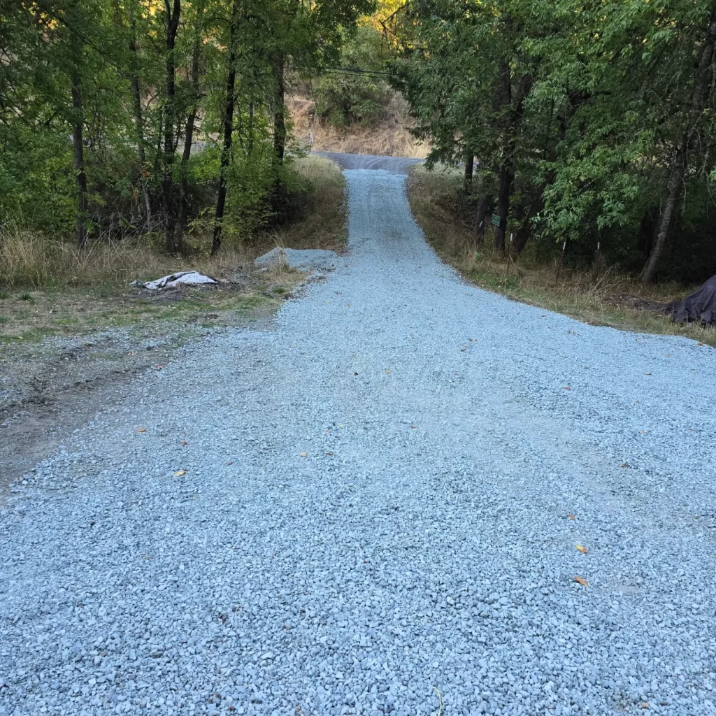 Custome review photo of rock driveway.